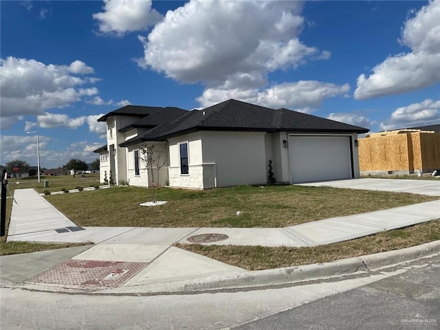 view of property exterior featuring a yard, stucco siding, a shingled roof, a garage, and driveway