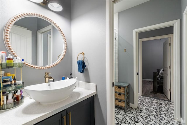 bathroom featuring vanity and hardwood / wood-style flooring