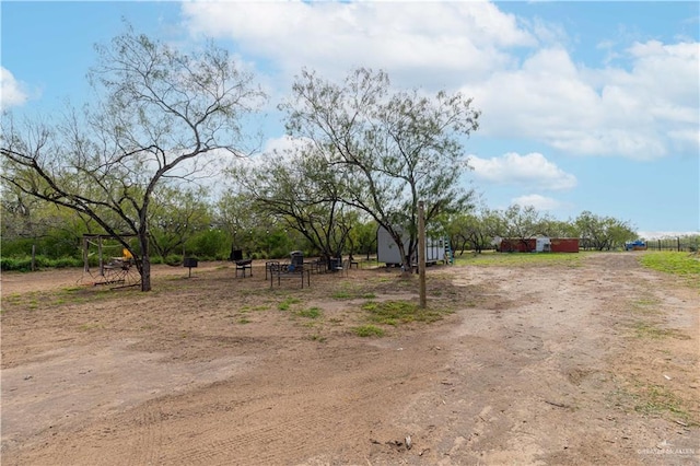 view of yard featuring a rural view