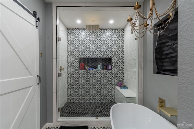 bathroom with plus walk in shower and an inviting chandelier