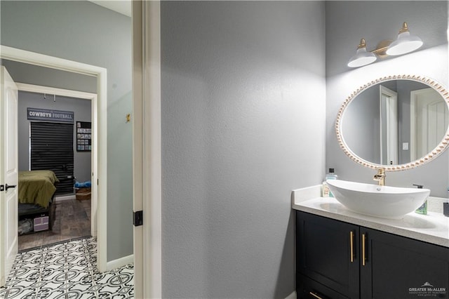 bathroom with wood-type flooring and vanity