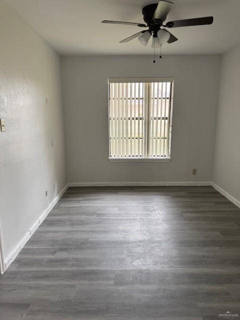 unfurnished room featuring hardwood / wood-style floors and ceiling fan