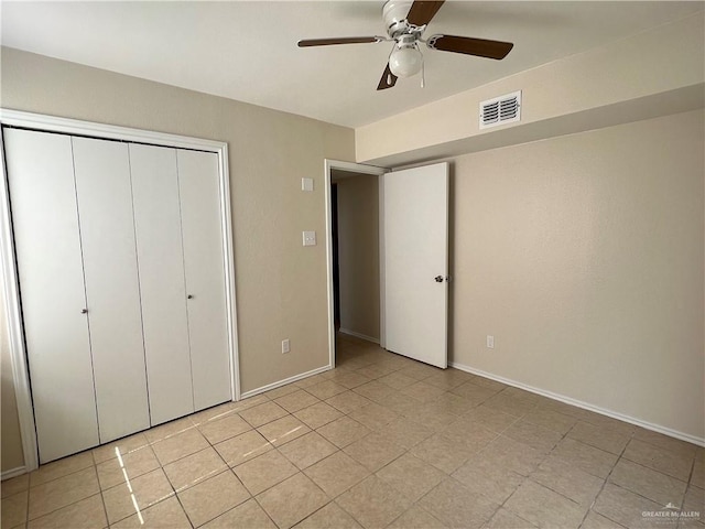 225 N 28th St, Mcallen, TX 78501 - unfurnished bedroom featuring a closet, baseboards, and ceiling fan
