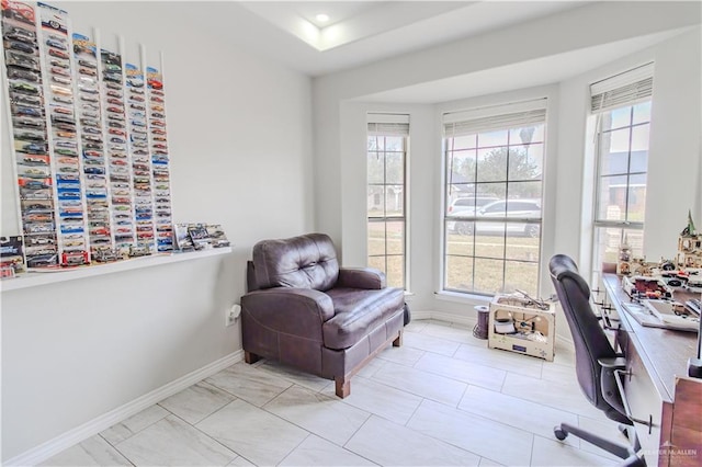 home office with baseboards, a wealth of natural light, and recessed lighting