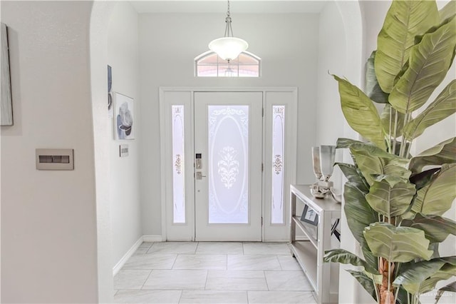 entrance foyer featuring a wealth of natural light