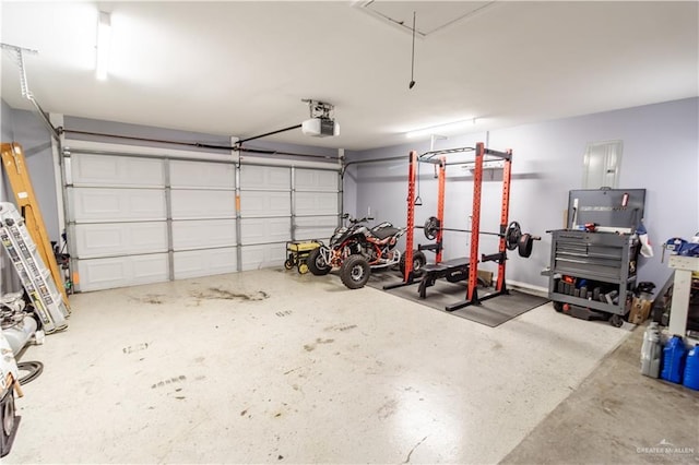 garage featuring a garage door opener