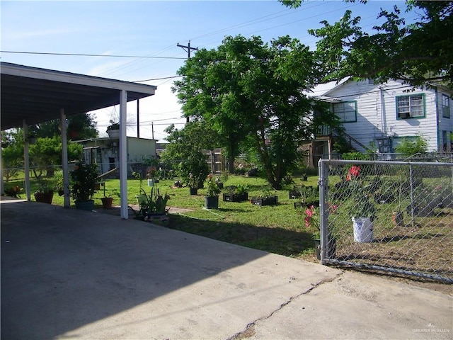 501 W Lovett St, Edinburg, TX 78541 - exterior space featuring fence and a carport