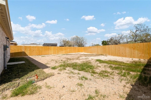 view of yard featuring a fenced backyard