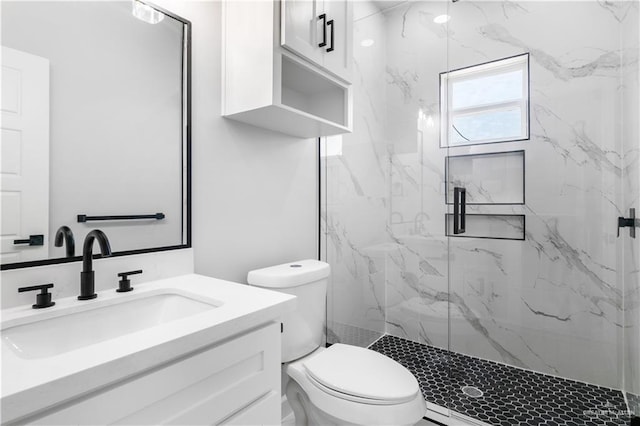 1326 S 9th St, Alamo, TX 78516 - full bath featuring a marble finish shower, toilet, and vanity