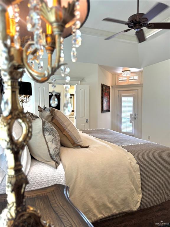 1630 E California Rd, Los Fresnos, TX 78566 - bedroom with ornamental molding, wood finished floors, and ceiling fan