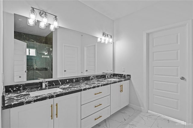 full bath featuring double vanity, a stall shower, baseboards, marble finish floor, and a sink