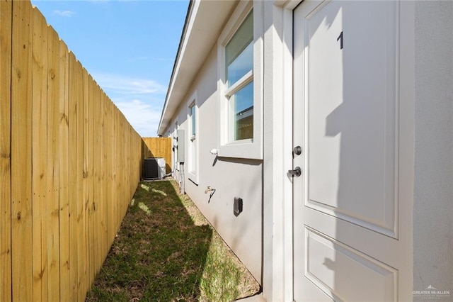 view of property exterior featuring a fenced backyard and stucco siding