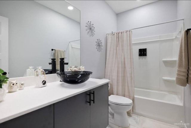 full bath featuring toilet, recessed lighting, vanity, marble finish floor, and shower / bath combo