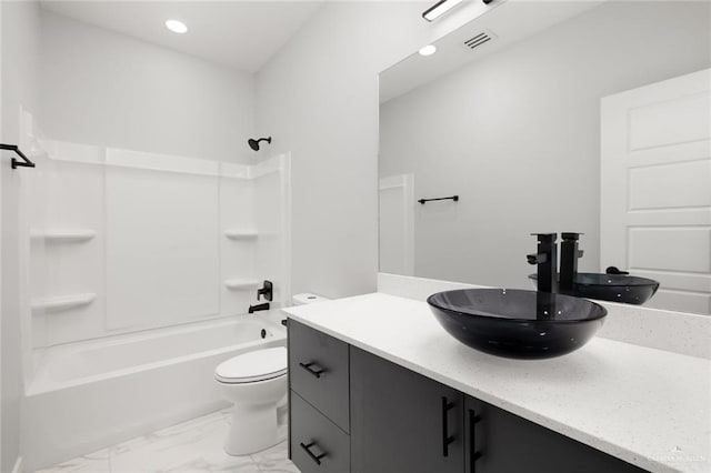 bathroom with visible vents, bathing tub / shower combination, toilet, marble finish floor, and vanity