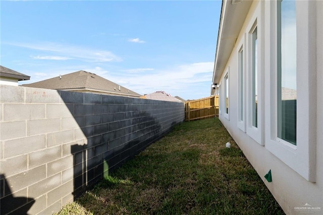 view of yard featuring a fenced backyard