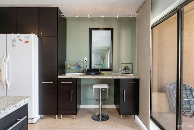 bathroom with tile patterned flooring