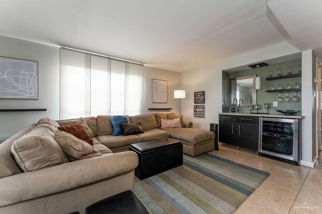 114 E Tarpon St Unit 201, South Padre Island, TX 78597 - living room featuring bar area, light tile patterned floors, and beverage cooler