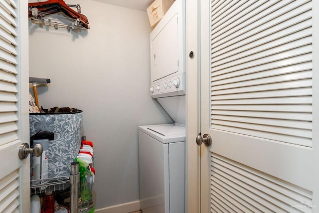 114 E Tarpon St Unit 201, South Padre Island, TX 78597 - clothes washing area featuring stacked washer and dryer