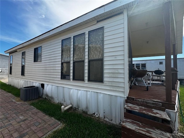 view of property exterior featuring cooling unit