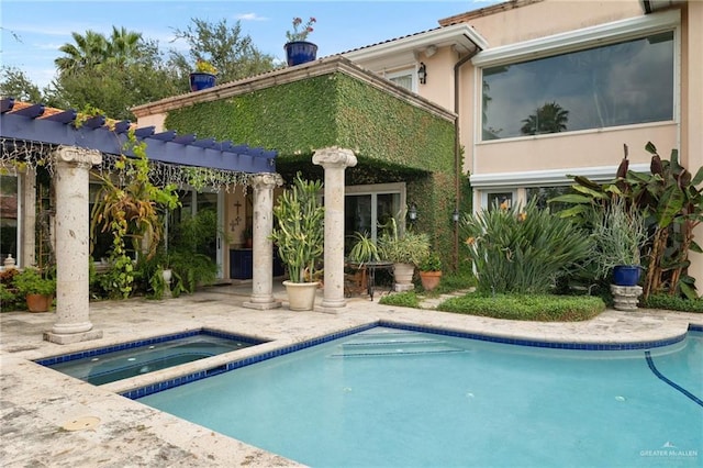 pool with an in ground hot tub