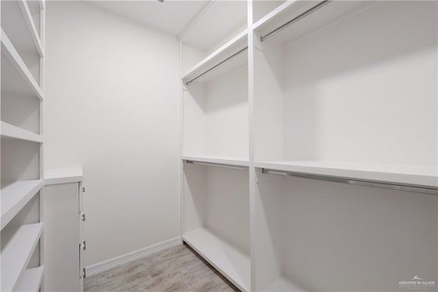 9817 Heights, Harlingen, TX 78552 - walk in closet featuring light wood-style flooring