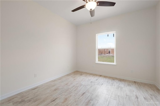 9817 Heights, Harlingen, TX 78552 - unfurnished room featuring light wood finished floors, ceiling fan, and baseboards