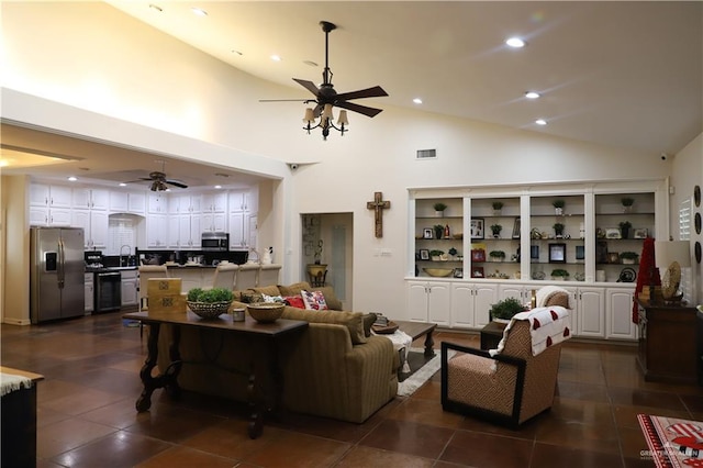 12431 Ware Rd, Edinburg, TX 78541 - living area with a ceiling fan, visible vents, high vaulted ceiling, recessed lighting, and dark tile patterned floors
