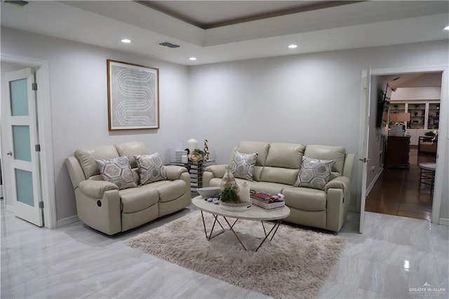 12431 Ware Rd, Edinburg, TX 78541 - living area with a raised ceiling, recessed lighting, visible vents, and baseboards