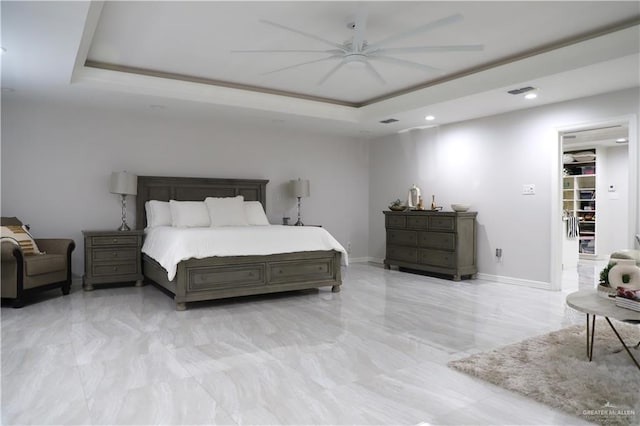 12431 Ware Rd, Edinburg, TX 78541 - bedroom featuring recessed lighting, a tray ceiling, baseboards, and ceiling fan