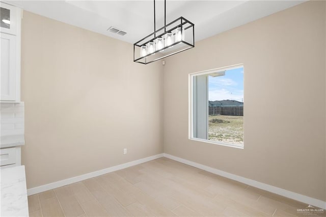 view of unfurnished dining area