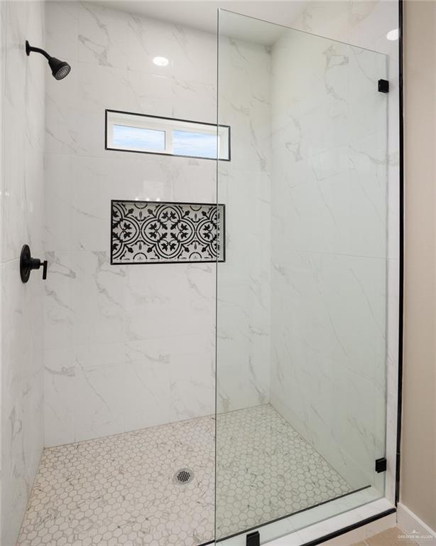 bathroom with walk in shower