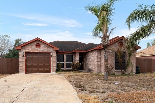 single story home featuring a garage