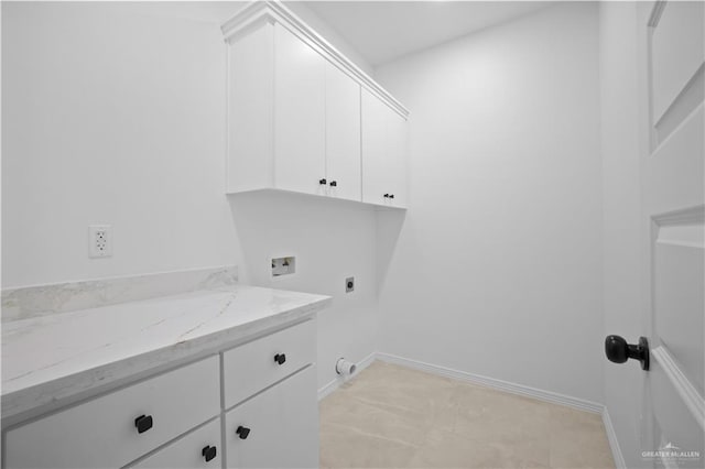 laundry area with washer hookup, cabinets, and hookup for an electric dryer