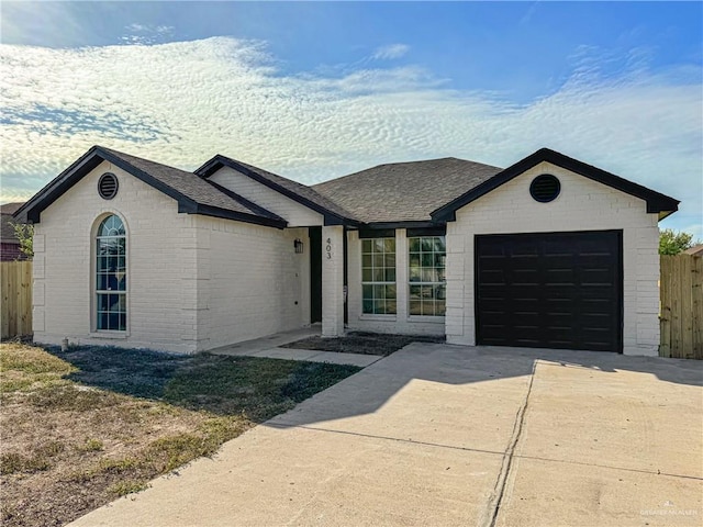 single story home with a garage