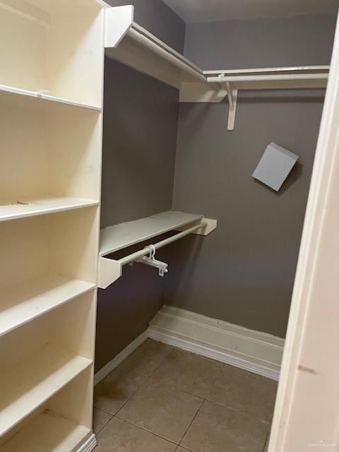 704 N Drennan St N, Edinburg, TX 78541 - walk in closet featuring light tile patterned floors