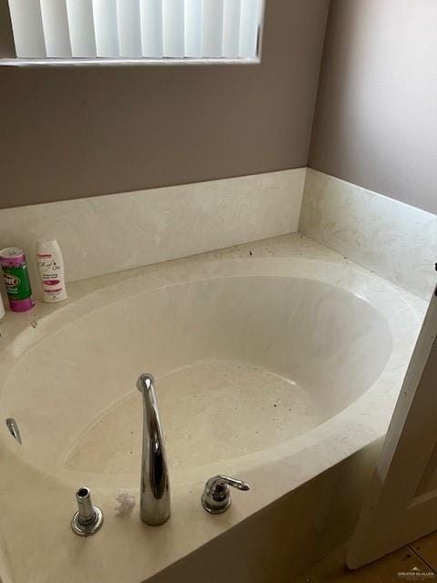704 N Drennan St N, Edinburg, TX 78541 - bathroom with a bath