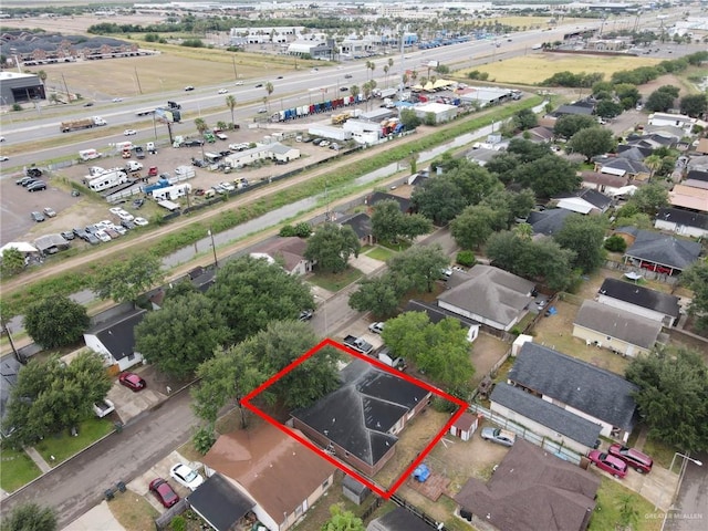 1507 Vatia Blvd, Mission, TX 78572 - aerial overview of property's location with property parcel outlined and an industrial area