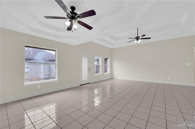 1507 Vatia Blvd, Mission, TX 78572 - unfurnished room featuring a tray ceiling, light tile patterned floors, and ceiling fan