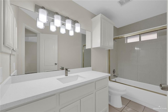 1507 Vatia Blvd, Mission, TX 78572 - full bath with vanity, tile patterned floors, and shower / bath combination with glass door