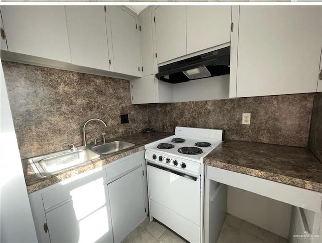 kitchen with tasteful backsplash, white cabinets, and electric range