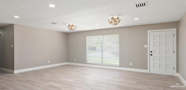 empty room with light wood-type flooring