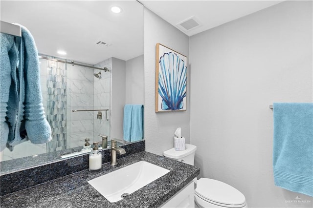 1000 Padre Blvd, South Padre Island, TX 78597 - full bathroom with toilet, a stall shower, vanity, and recessed lighting