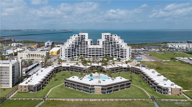 birds eye view of property with a water view