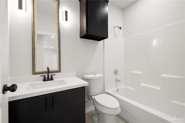 full bathroom featuring vanity, tub / shower combination, and toilet