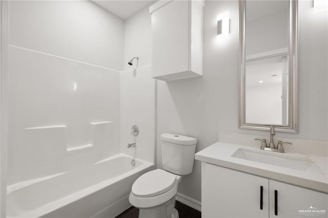 full bathroom with  shower combination, toilet, and vanity