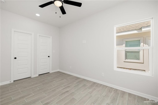 unfurnished bedroom with ceiling fan