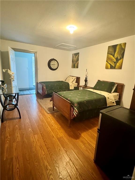 bedroom featuring hardwood / wood-style floors