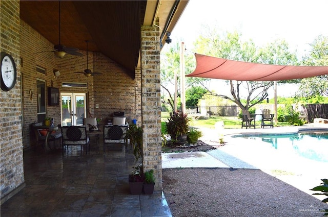 exterior space featuring ceiling fan, a patio area, and french doors