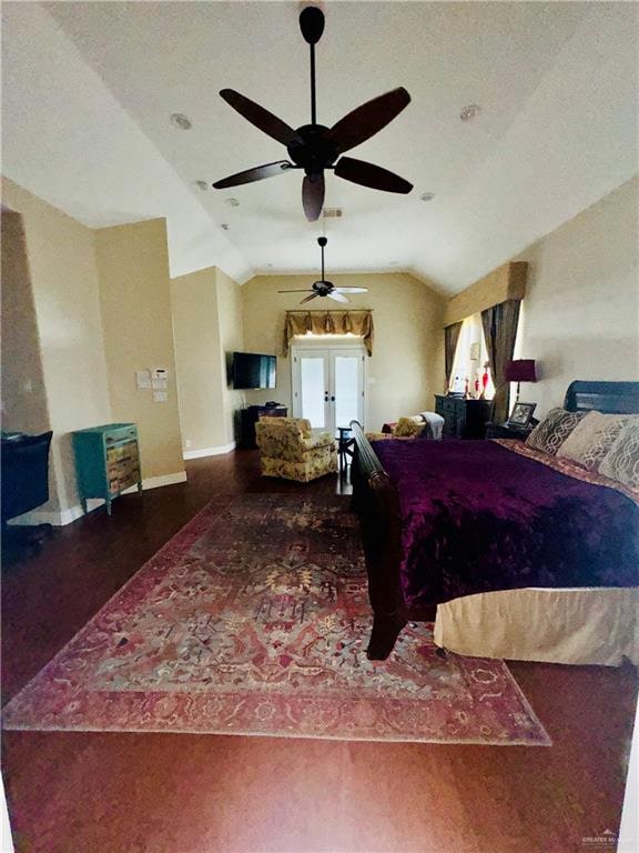 bedroom with ceiling fan, french doors, dark wood-type flooring, a textured ceiling, and vaulted ceiling