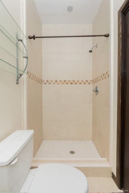 813 Travis St Unit 205, Mission, TX 78572 - bathroom featuring toilet, a shower stall, and recessed lighting